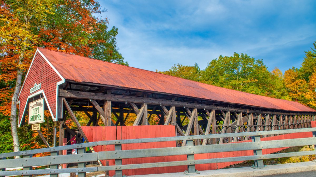 The Bartlett covered bridge, now a gift shop, seen from the road in Bartlett, New Hampshire, in autumn