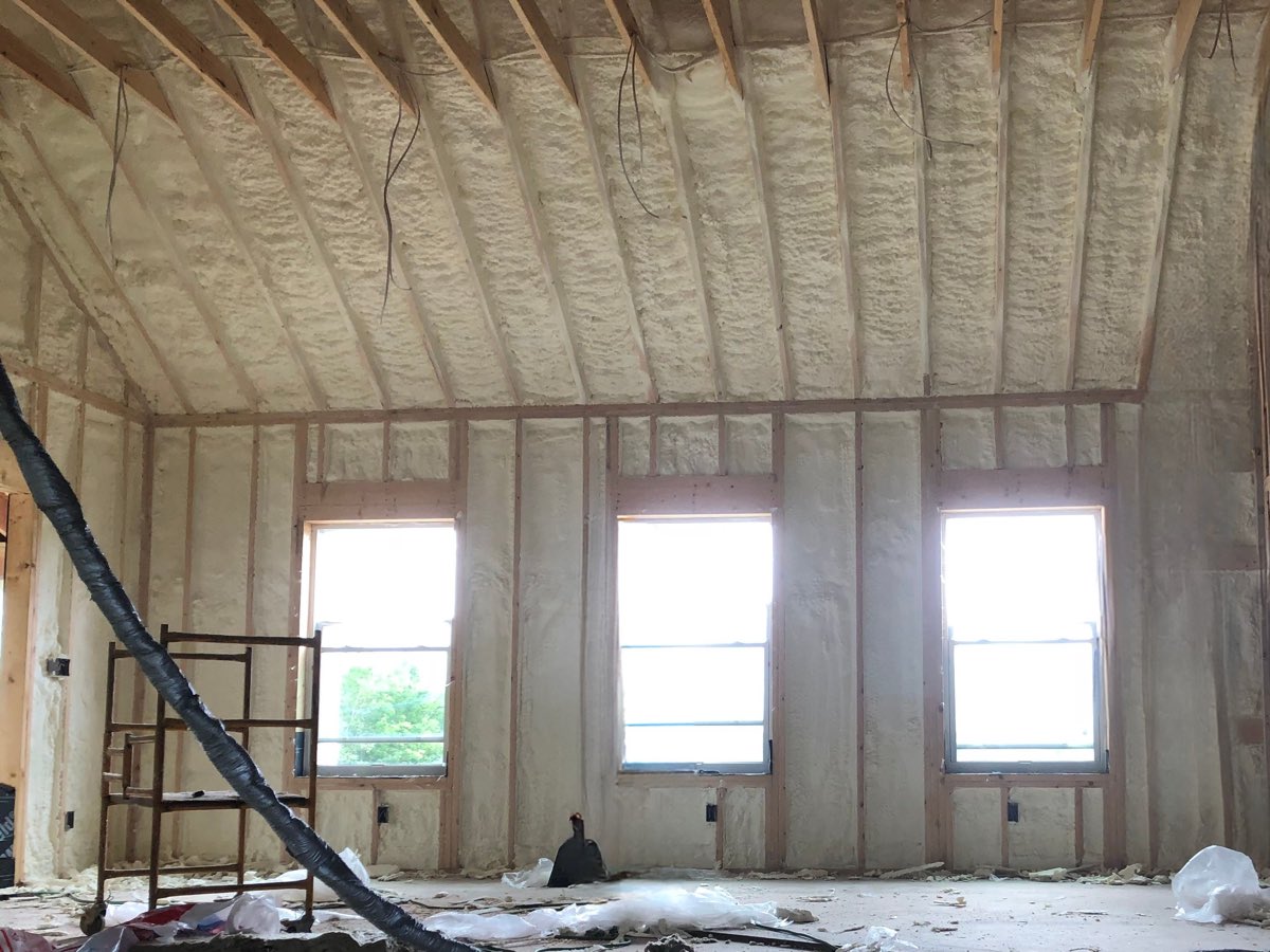 Cathedral ceiling and exterior walls fully insulated with open-cell spray foam, sealed at every rafter bay