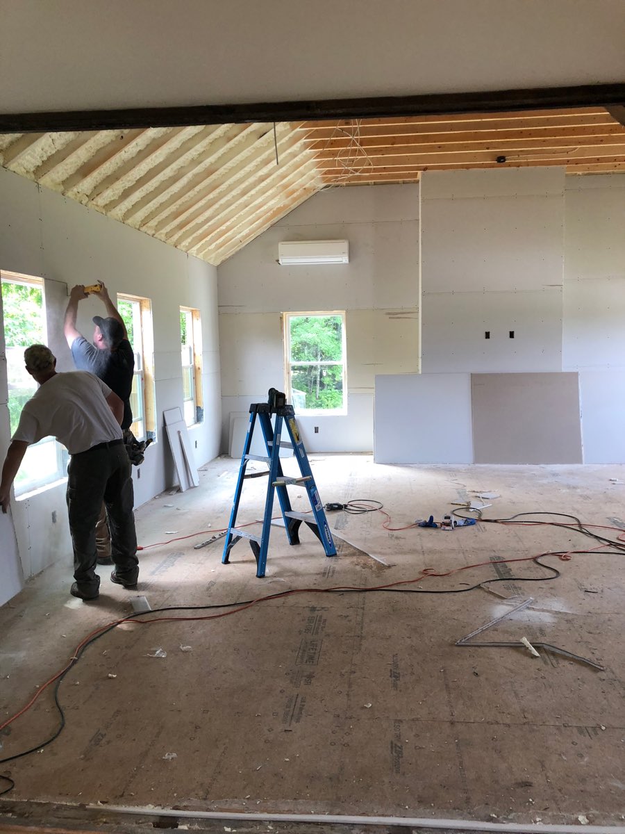 The same room after Maine-ly Foam finished the drywall, with the insulated cathedral ceiling above